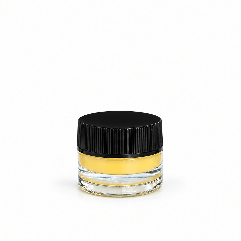 Nourishing balm jar with deeper black lid