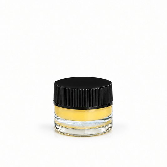 Nourishing balm jar with deeper black lid
